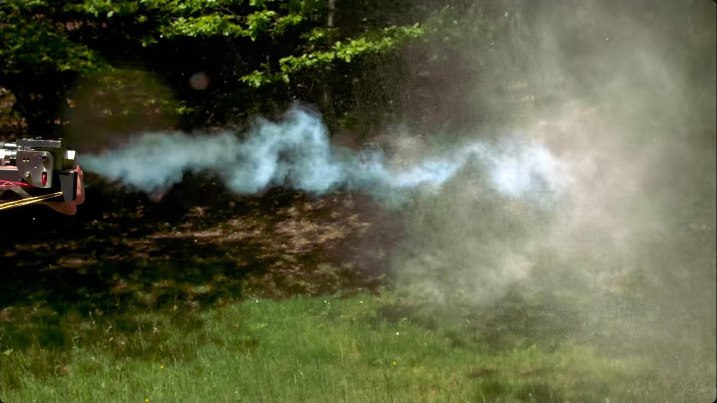 Aftermath of firing the full 3-liter tank at maximum pressure, showing the vapor cloud and expelled debris field. The target was effectively atomized rather than merely fragmented.